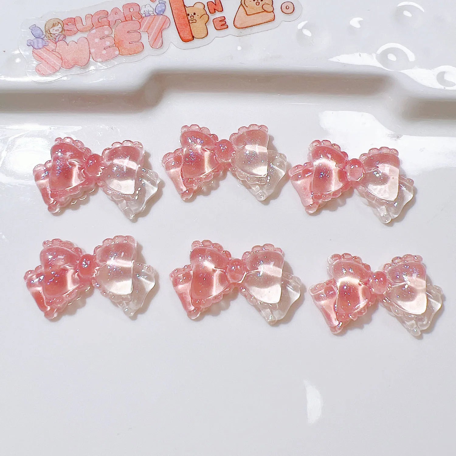 100pcs/bag Mini Kawaii Transparent Bow Bowknot Resin Flat Back Cabochon Scrapbook DIY Nail Craft Embellishments Accessories