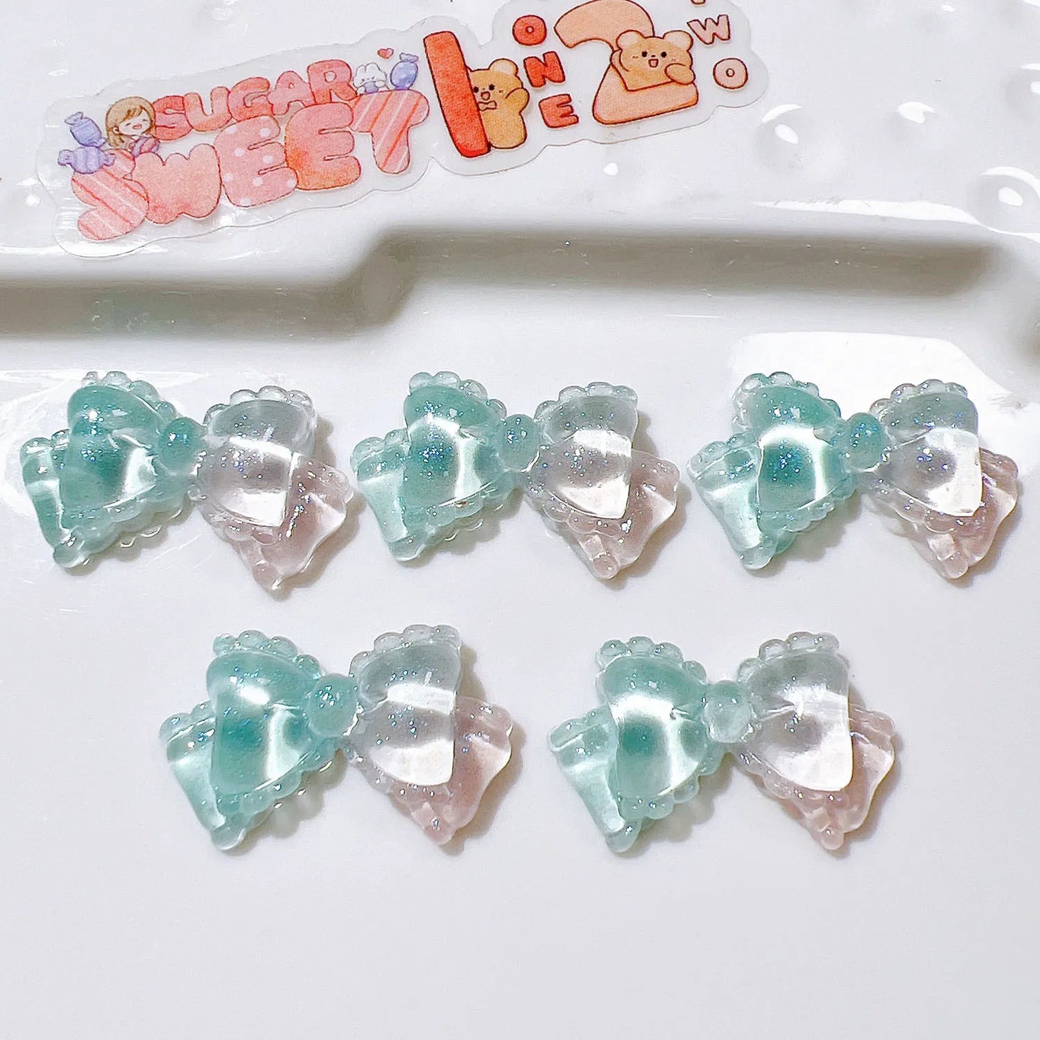 100pcs/bag Mini Kawaii Transparent Bow Bowknot Resin Flat Back Cabochon Scrapbook DIY Nail Craft Embellishments Accessories