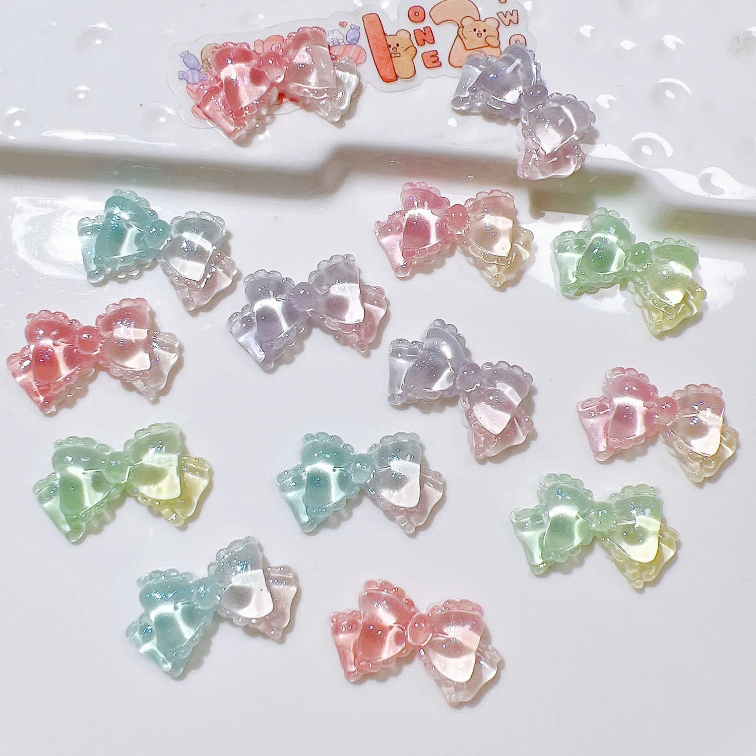 100pcs/bag Mini Kawaii Transparent Bow Bowknot Resin Flat Back Cabochon Scrapbook DIY Nail Craft Embellishments Accessories