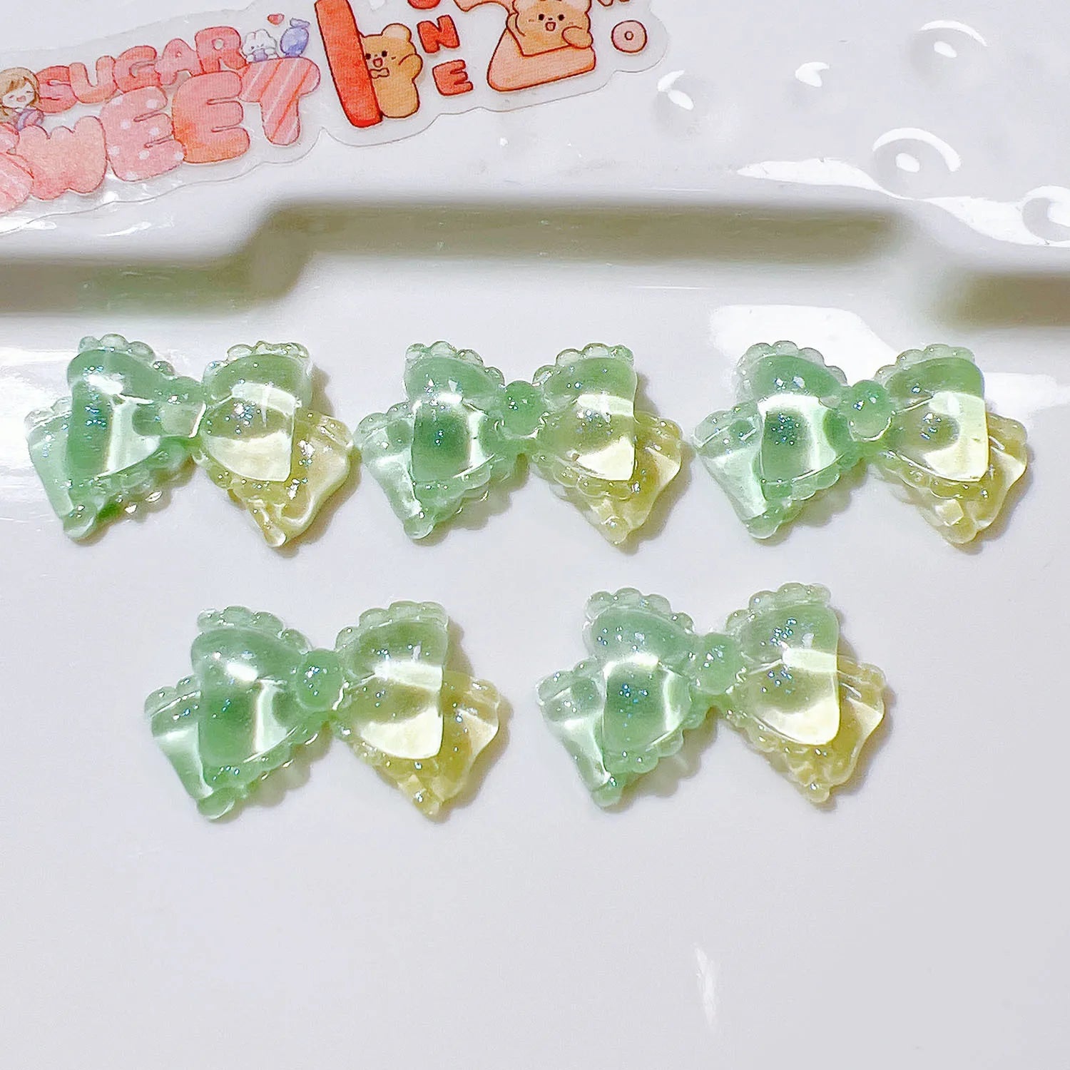 100pcs/bag Mini Kawaii Transparent Bow Bowknot Resin Flat Back Cabochon Scrapbook DIY Nail Craft Embellishments Accessories